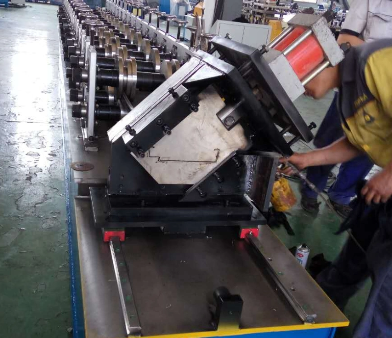 Hot Rolled Coil Metal Roof Panel Roll Forming Machine Steel Profile Roller Shutter Door Gate Frame Shaping Machine